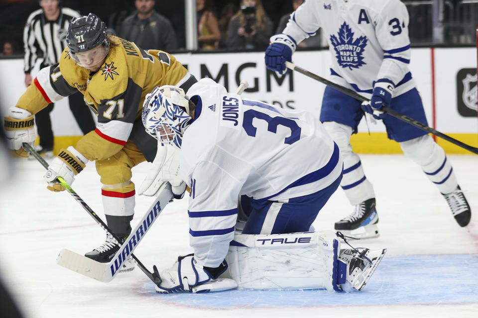 Vegas Golden Knights center William Karlsson (71) has his shot stopped by Toronto Maple Leafs goaltender Martin Jones (31) during the second period of an NHL hockey game Thursday, Feb. 22, 2024, in Las Vegas. (AP Photo/Ian Maule)