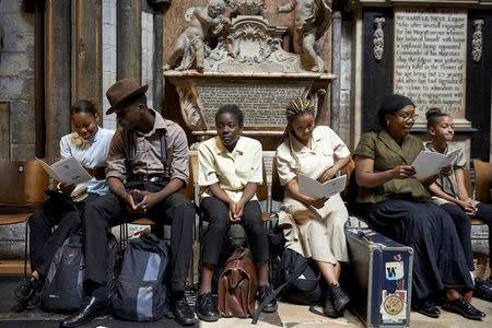 Performers from the HEbE Foundation charity prepare to perform during a Service of Thanksgiving to mark the 70th anniversary of the landing of the Windrush, at Westminster Abbey, London, Britain, June 22, 2018. Niklas Halle'n/Pool via REUTERS