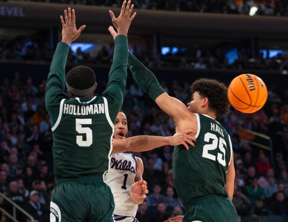 Kansas State’s Markquis Nowell throws one of his 19 assists during the second half of their east region semifinal game against Michigan State at Madison Square Garden on Thursday night.