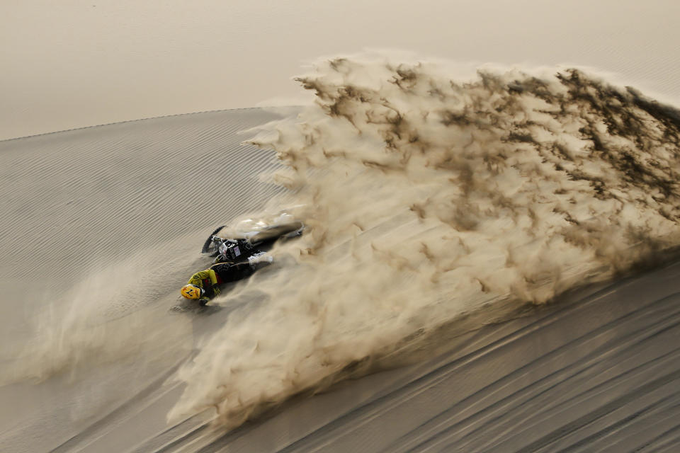 <p>Jan Brabec of Czech Republic falls from his Husqvarna motorbike during the stage nine of the Dakar Rally in Pisco, Peru, Wednesday, Jan. 16, 2019. (AP Photo/Ricardo Mazalan) </p>