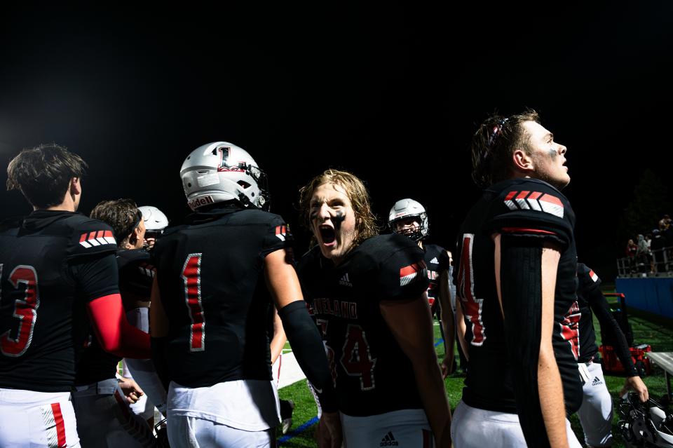 A Loveland football player celebrates after the season opener against the Fossil Ridge Sabercats at Ray Patterson Field in Loveland on Friday, Aug. 25, 2023. Loveland won the game 28-26.