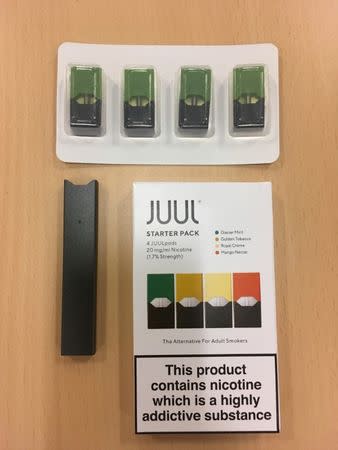 FILE PHOTO: Juul e-cigarette starter pack is seen in this picture illustration taken July 16, 2018. REUTERS/Martinne Geller/Illustration/File Photo