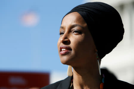 Rep. Ilhan Omar (D-MN) speaks about Trump administration policies toward Muslim immigrants and her own immigrant background at a news conference by members of the U.S. Congress "to announce legislation to repeal President Trump’s existing executive order blocking travel from majority Muslim countries" outside the U.S. Capitol in Washington, U.S., April 10, 2019. REUTERS/Jim Bourg/Files