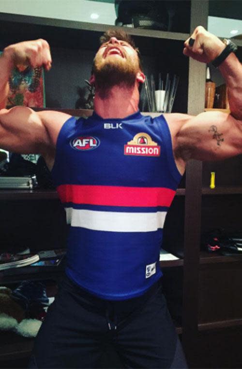 <p>When the Western Bulldogs won the AFL Grand Final last year Chris was VERY happy! He can flex those biceps anytime he wants!</p>