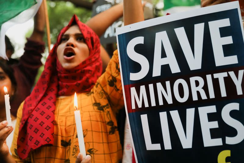 Citizens attend a peace vigil organised by citizens against what they say is rise in hate crimes and violence against Muslims, in New Delhi