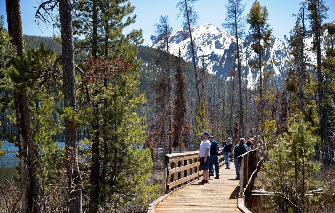 People visit Stanley Lake inside the Sawtooth National Recreation Area on May 24.