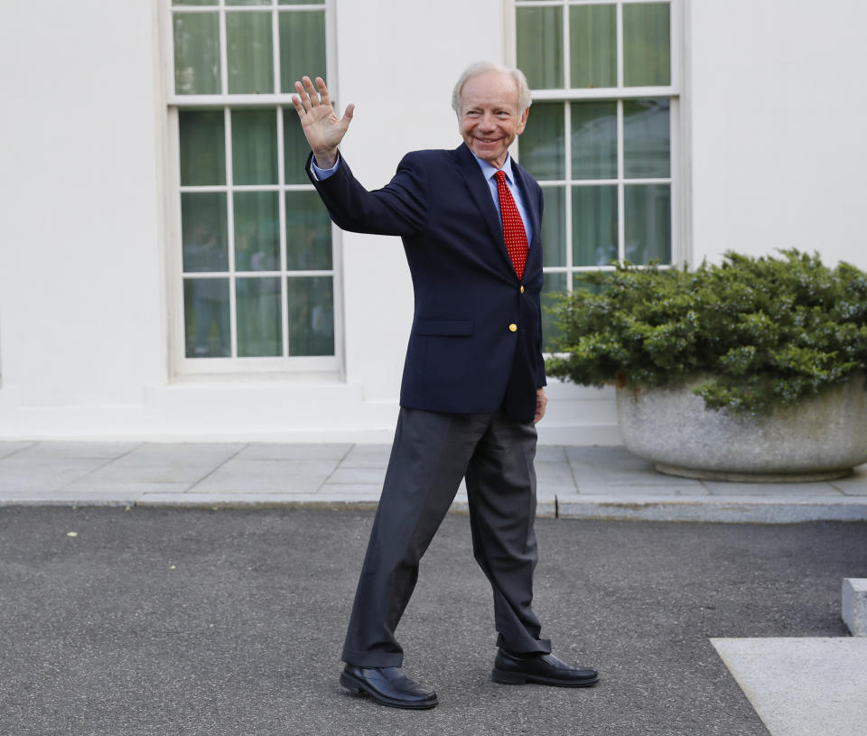 FILE - Former Connecticut Sen. Joe Lieberman waves to members of the media as he leaves the West Wing of the White House in Washington, May 17, 2017. Lieberman, who nearly won the vice presidency on the Democratic ticket with Al Gore in the disputed 2000 election and who almost became Republican John McCain's running mate eight years later, has died Wednesday, March 27, 2024, according to a statement issued by his family. He was 82. (AP Photo/Pablo Martinez Monsivais, File)