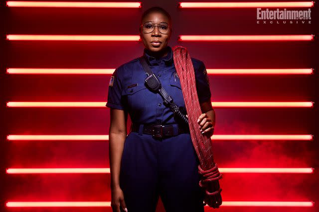 <p>Disney/Justin Stephens</p> Aisha Hinds as '9-1-1' firefighter Hen Wilson