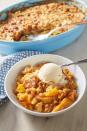 <p>This no-stress dessert is what they mean by peachy keen.</p><p>Get the recipe from <a href="https://www.delish.com/cooking/recipe-ideas/a27973835/peach-dump-cake/" rel="nofollow noopener" target="_blank" data-ylk="slk:Delish;elm:context_link;itc:0;sec:content-canvas" class="link ">Delish</a>. </p>