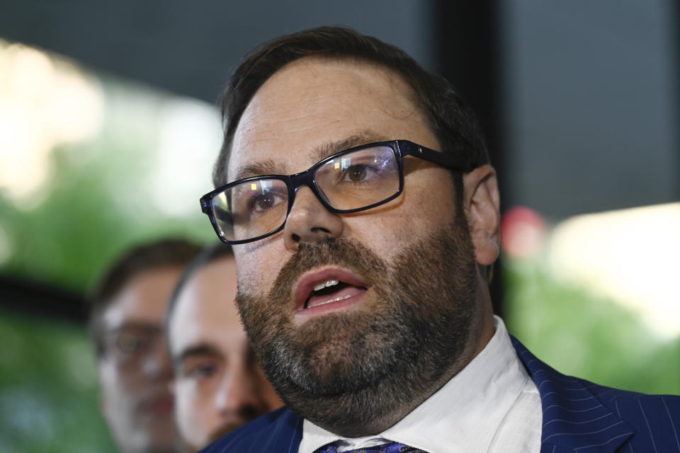 Attorney Beau Brindley, speaks about his client, Derrel McDavid, at the Dirksen Federal Courthouse in Chicago after verdicts were reached in R. Kelly's trial, Wednesday, Sept. 14, 2022, in Chicago. Kelly associates Derrel McDavid and Milton Brown were co-defendants at the Chicago trial. Jurors acquitted McDavid, a longtime Kelly business manager, who was accused of conspiring with Kelly to rig the 2008 trial. Brown, a Kelly associate for years, was acquitted of receiving child pornography. (AP Photo/Matt Marton)