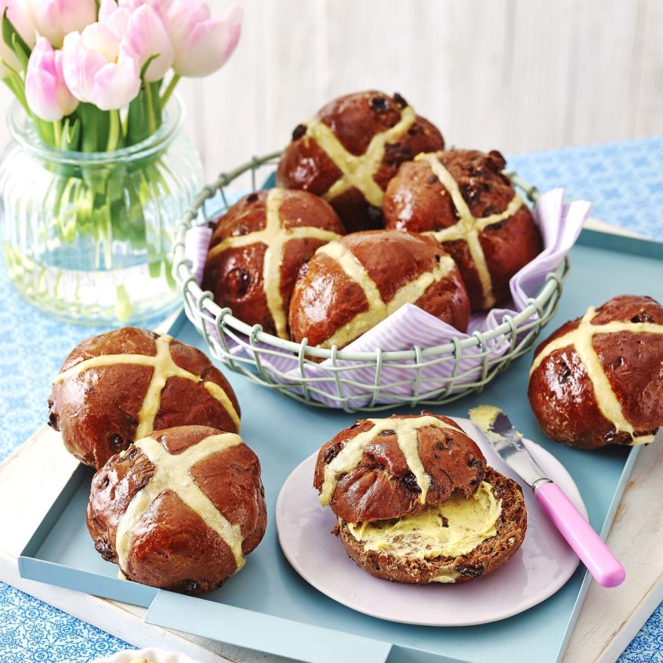 <p>Complete with orange glaze and zesty spiced butter (or serve with salted butter or zesty marmalade), these generous chocolate buns are a seasonal teatime treat.</p><p><strong>Recipe: <a href="https://www.goodhousekeeping.com/uk/food/recipes/a43292403/chocolate-hot-cross-buns/" rel="nofollow noopener" target="_blank" data-ylk="slk:Chocolate Hot Cross Buns;elm:context_link;itc:0" class="link ">Chocolate Hot Cross Buns</a></strong></p>