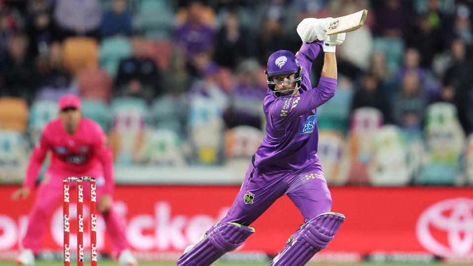 Tim David is seen here batting for the Hurricanes against the Sixers in the BBL.