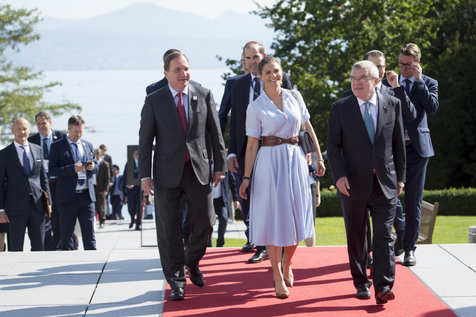 International Olympic Committee IOC president Thomas Bach from Germany, right, arrives with Sweden's Crown Princess Victoria, center, and Swedish Prime Minister Stefan Lofven, in Lausanne, Switzerland, Sunday, June 23, 2019. The host city of the 2026 Olympic Winter Games will be decided in Lausanne on Monday. (Laurent Gillieron/Keystone via AP))