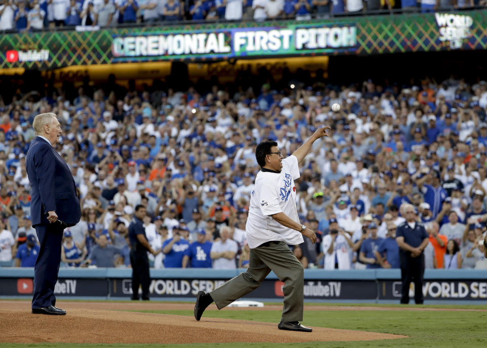 <p>Vin Scully and Fernando Valenzuela throw out the ceremonial first pitch before Game 2 of baseball’s World Series between the Houston Astros and the Los Angeles Dodgers Wednesday, Oct. 25, 2017, in Los Angeles. (AP Photo/Matt Slocum) </p>