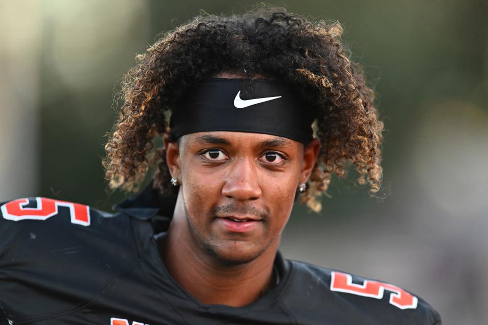 Pittsburg quarterback Jaden Rashada (5) warms up before the start of their game against McClymonds at Pittsburg High School in Pittsburg, Calif., on Sept. 30, 2022. Florida has granted Rashada a release from his national letter of intent. It comes three days after he requested to be let go because the Gator Collective failed to honor a four-year name, image and likeness deal worth more than $13 million. (Jose Carlos Fajardo/Bay Area News Group via AP)/Bay Area News Group via AP)