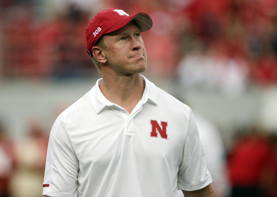 Nebraska head coach Scott Frost looks at the overcast sky before an NCAA college football game against Akron in Lincoln, Neb., Saturday, Sept. 1, 2018. (AP Photo/Nati Harnik)