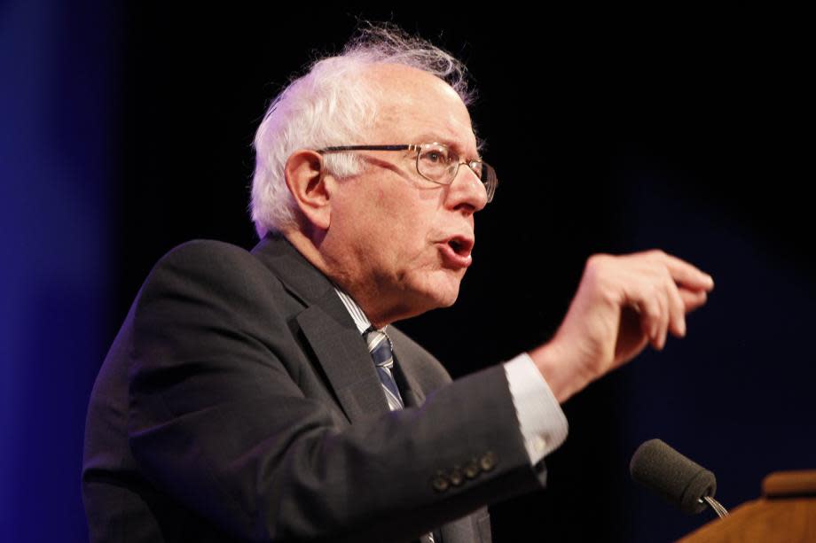 Senator Bernie Sanders speaking to a crowd.