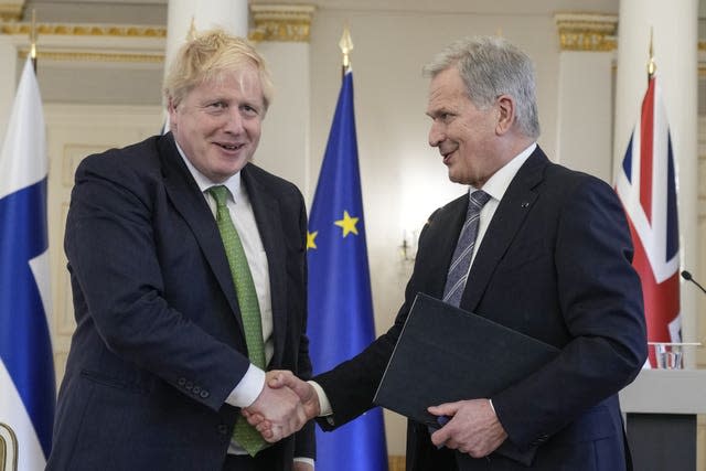 Prime Minister Boris Johnson (left) and Finland’s president Sauli Niinisto shake hands 