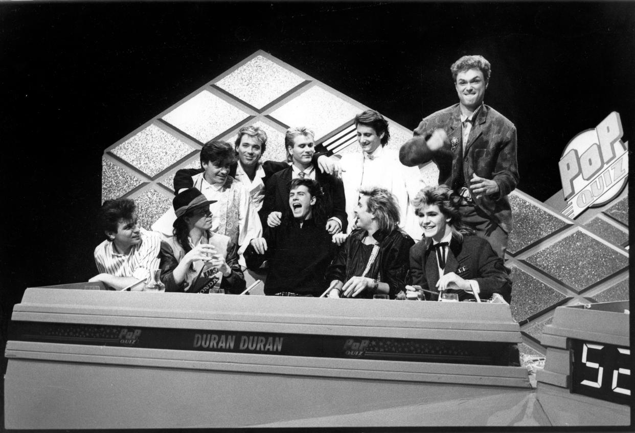 Spandau Ballet and Duran Duran appear on the TV show <em>Pop Quiz</em> . Back, from left: John Keeble, Martin Kemp, Steve Norman, Tony Hadley, Gary Kemp. Front, from left: Roger Taylor, Andy Taylor, John Taylor, Simon Le Bon, Nick Rhodes. (Photo: Virginia Turbett/Redferns)