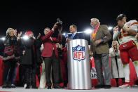 Chairman and CEO of the Kansas City Chiefs Clark Hunt holds the Lamar Hunt trophy after an AFC Championship NFL football game against the Baltimore Ravens, Sunday, Jan. 28, 2024, in Baltimore. The Chiefs won 17-10. (AP Photo/Matt Slocum)