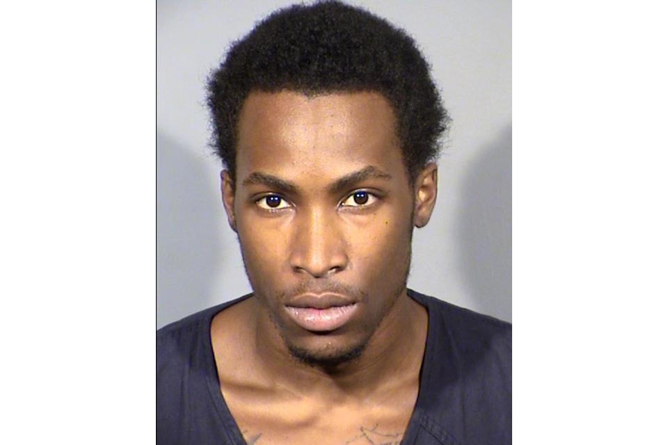 This Clark County Detention Center booking photo shows Noah Green, 21, of Las Vegas, following his arrest late Friday, July 17, 2020, on murder, attempted murder and other charges. Las Vegas police say Green is suspected of what a homicide lieutenant called the "thrill killing" of a sleeping homeless man and the unprovoked shooting of a man walking his dog in a Las Vegas park, both recorded on Green's cellphone video. (Clark County Detention Center via AP)