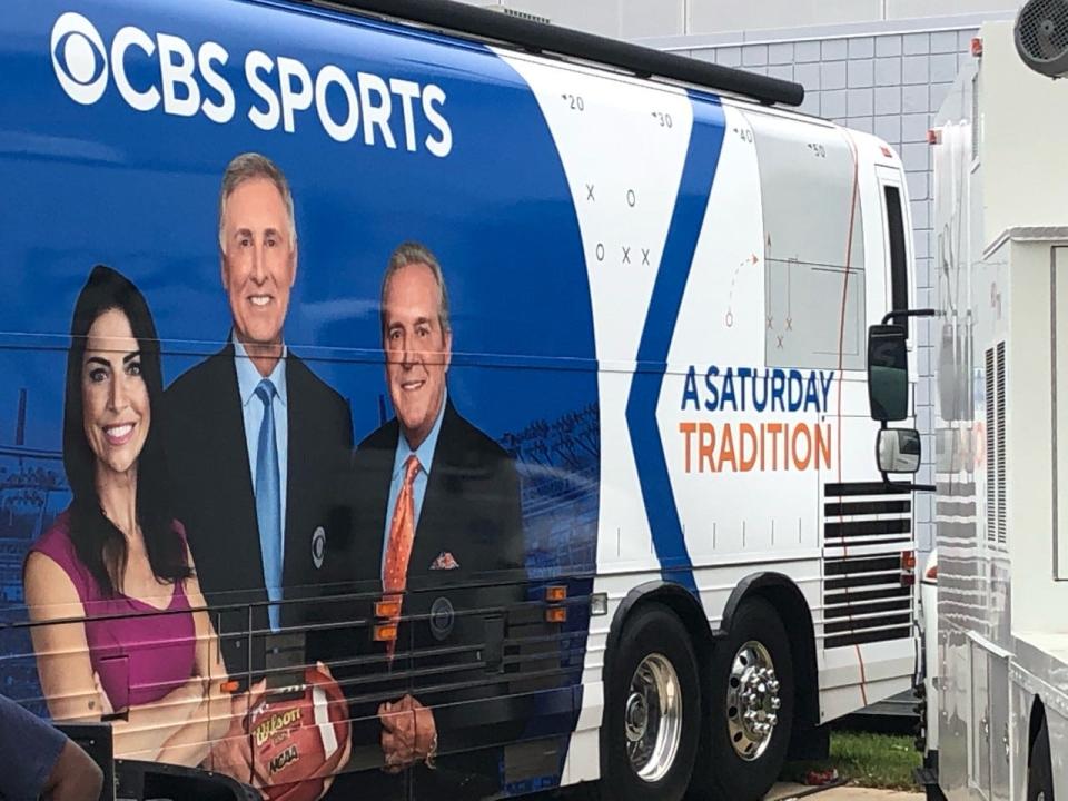 CBS trucks park outside TIAA Bank Field in Jacksonville to produce Saturday's Georgia-Florida game.