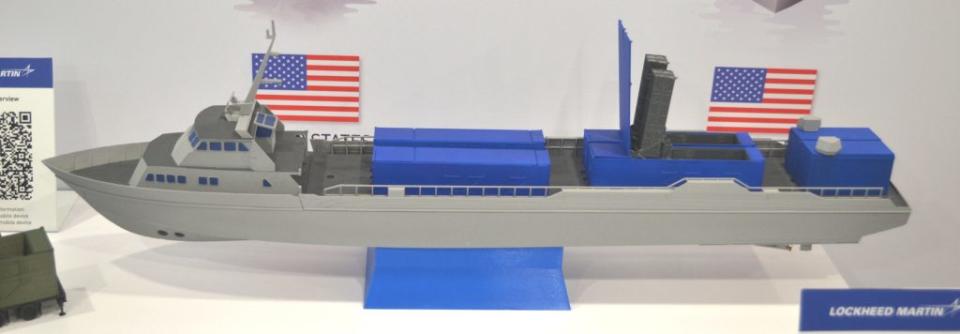 A Lockheed Martin model depicting a large uncrewed surface vessel armed with Mk 70 containerized launchers. <em>Joseph Trevithick</em> A Lockheed Martin model depicting a large uncrewed surface vessel armed with Mk 70 containerized launchers. This model also shows containers with electronic warfare systems at the rear. <em>Joseph Trevithick</em>