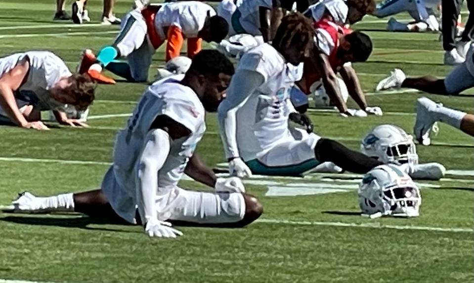 Dolphins receiver DeVante Parker stretches during Wednesday's practice.