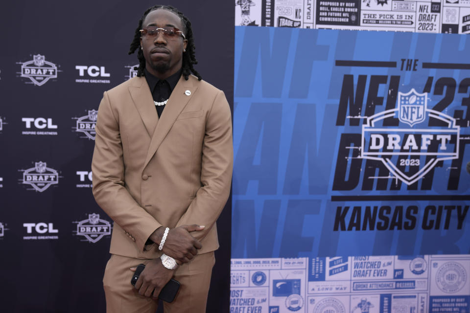 Penn State cornerback Joey Porter Jr. arrives on the red carpet before the first round of the NFL football draft, Thursday, April 27, 2023, in Kansas City, Mo. (AP Photo/Charlie Riedel)