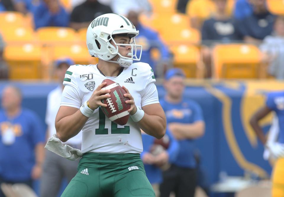 Nathan Rourke looks for an open receiver against Pittsburgh on Sept. 7, 2019 when he was the quarterback for Ohio University during the 2019 season.