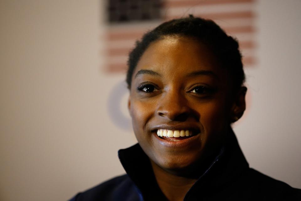 <p>At 19 years old, Simone Biles has won three back-to-back all-around world titles and can now add “all-around Olympic gymnastics gold medalist” to her resume. (Getty) </p>