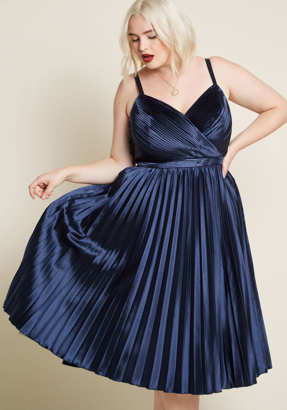 <strong>Sizes</strong>: 2 to 26<a href="https://www.modcloth.com/shop/dresses/chi-chi-london-own-the-moment-midi-dress-chi-chi-london-in-navy/161248.html" target="_blank" rel="noopener noreferrer">Get it at Modcloth</a>, $119.&nbsp;