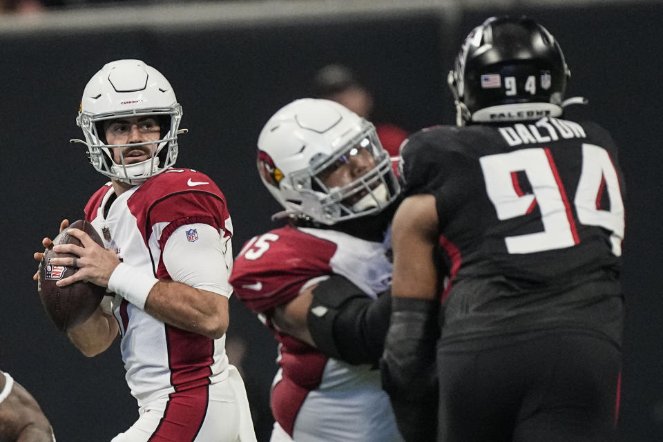 Arizona Cardinals quarterback David Blough (17) works from the pocket against the Atlanta Falcons during the second half of an NFL football game, Sunday, Jan. 1, 2023, in Atlanta. (AP Photo/John Bazemore)