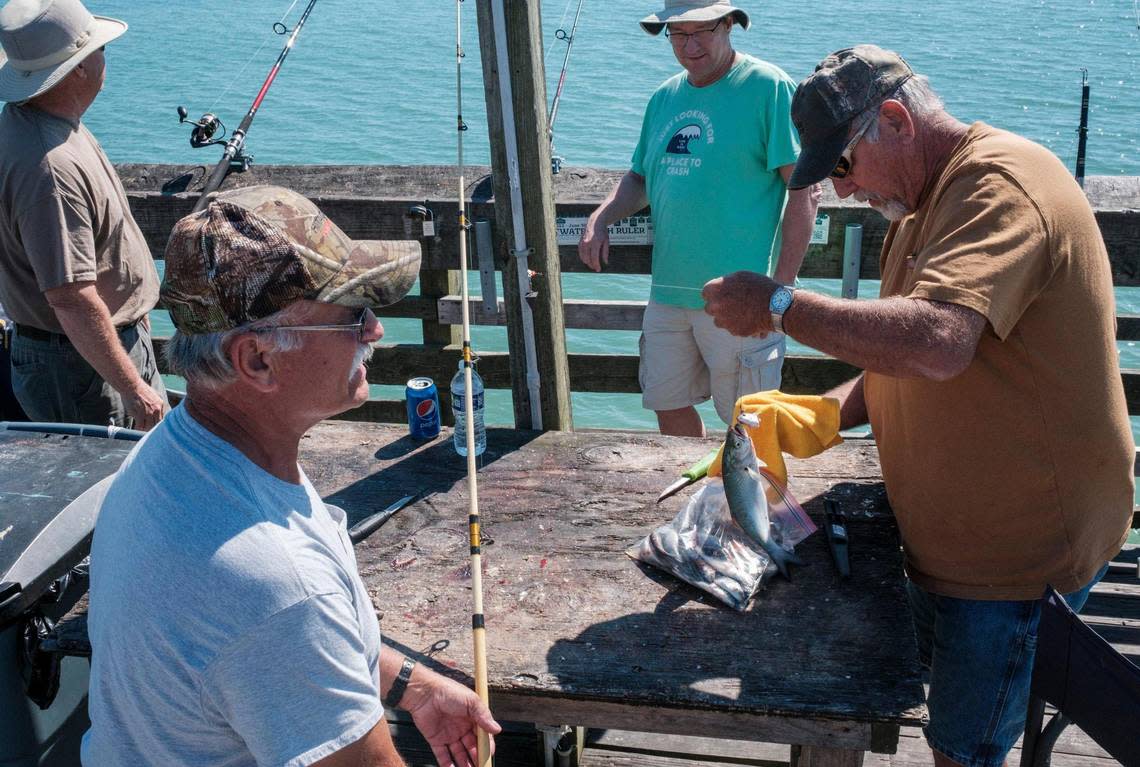 A group of friends from around the region gather together each September and October to fish off of Pier 14 in Myrtle Beach. October 7, 2022.