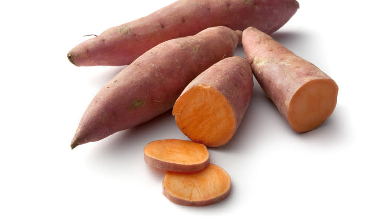 Partially sliced sweet potato