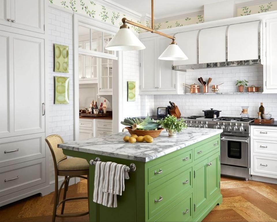 <p>These subway tiles cover the whole kitchen in this <a href="https://www.elledecor.com/design-decorate/house-interiors/a34147364/tom-scheerer-upper-east-side-apartment/" rel="nofollow noopener" target="_blank" data-ylk="slk:Upper East Side apartment designed by Tom Scheerer and architect Gil P. Schafer;elm:context_link;itc:0;sec:content-canvas" class="link ">Upper East Side apartment designed by Tom Scheerer and architect Gil P. Schafer</a>, from the backsplash to the walls. </p>