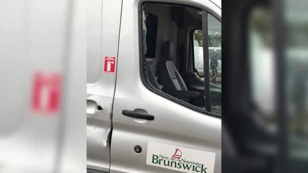 Twelve Anglophone East School District vehicles parked at a Moncton school were broken into last week. Several catalytic converters were stolen from under the vehicles, while tools used for school maintenance were also stolen. (Candace Scott/Submitted - image credit)