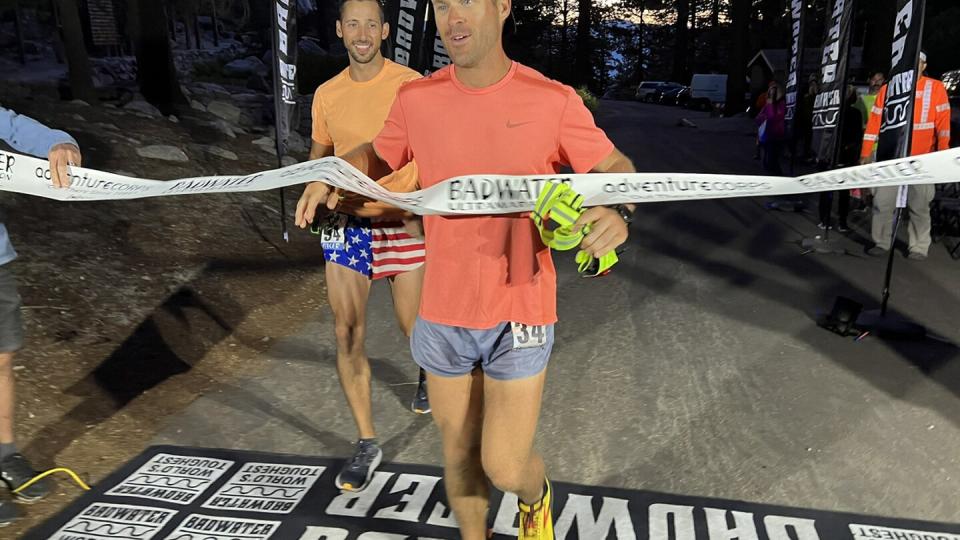 Chas Kabanuck crosses the finish line at the Badwater 135 through Death Valley, California, in 2022. It's another race that bills itself as the hardest run in the world. (Chris Kostman/Courtesy of AdventureCORPS.com)