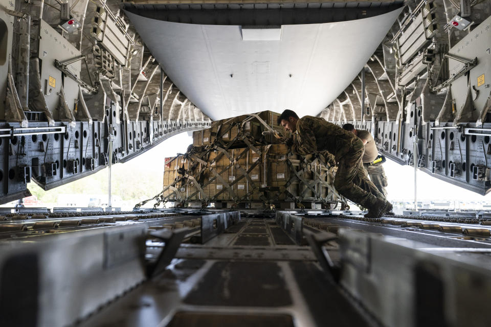 FILE - A pallet of fuses for 155 mm shells, ultimately bound for Ukraine, is spun as it's loaded on to a C-17 cargo aircraft, April 29, 2022, at Dover Air Force Base, Del. (AP Photo/Alex Brandon, File)