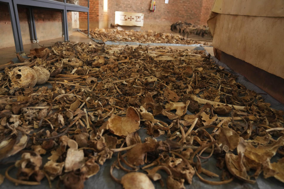 Newly discovered skulls and bones of some of those who were killed as they sought refuge inside and around the Catholic church are laid out on the floor as a memorial to the thousands who were killed during the 1994 genocide, in Nyamata, Rwanda, Friday, April 5, 2024. An estimated 800,000 Tutsis were killed by extremist Hutus in massacres that lasted over 100 days in 1994. Some moderate Hutu who tried to protect members of the Tutsi minority were also targeted. (AP Photo/Brian Inganga)