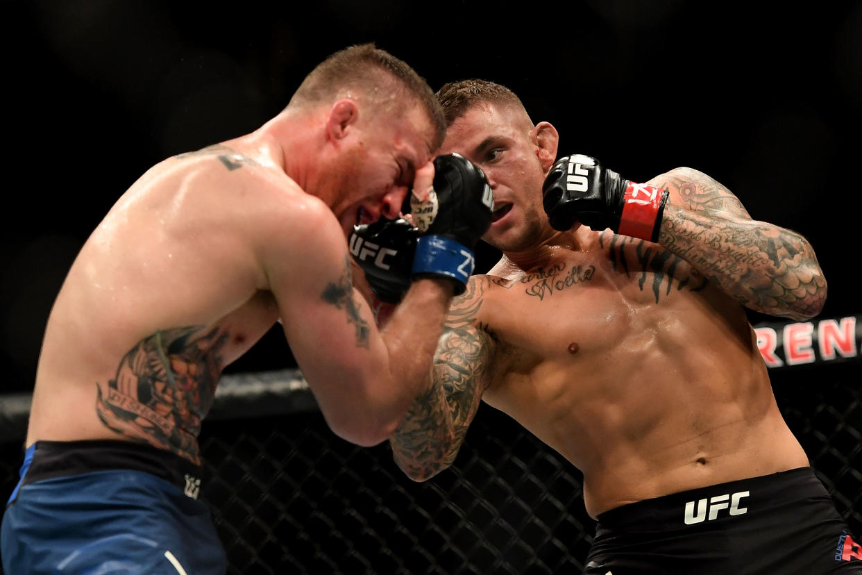 GLENDALE, AZ - APRIL 14:  (R-L) Dustin Poirier punches Justin Gaethje in their lightweight fight during the UFC Fight Night event at Gila River Arena on April 14, 2018 in Glendale, Arizona.  (Photo by Jennifer Stewart/Getty Images)