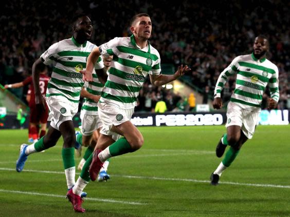 Ryan Christie celebrates scoring for Celtic (PA)