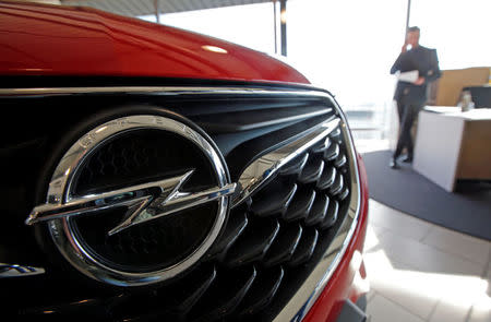 An Opel logo is seen on car at a dealership in Marseille, France, February 22, 2017. REUTERS/Jean-Paul Pelissier