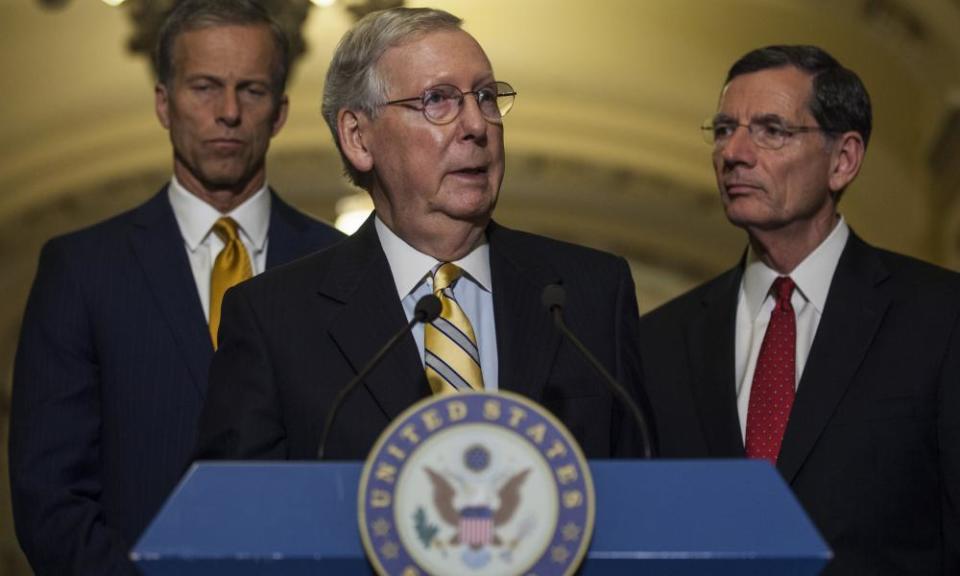 The Senate majority leader, Mitch McConnell, speaks at a press conference. The Senate has approved new sanctions against Russia.