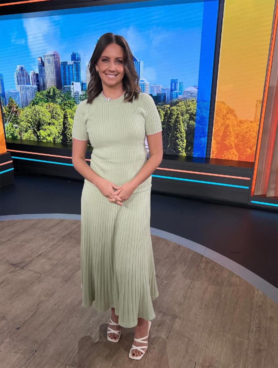 Brooke Boney in a green Australian designed dress