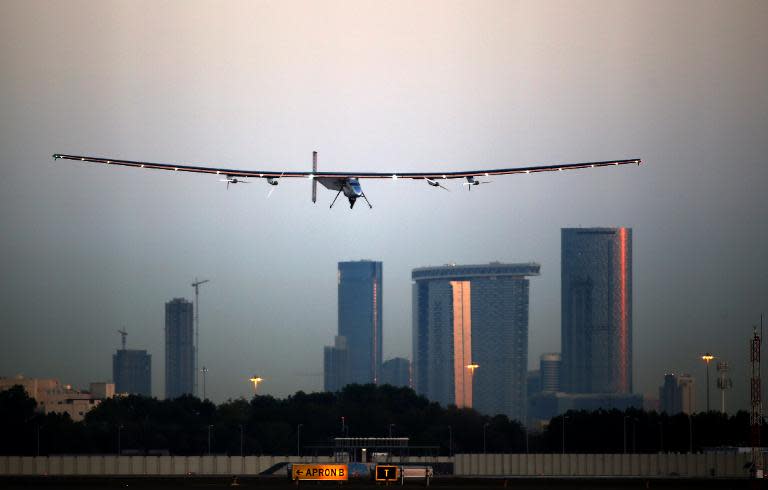 Bertrand Piccard lands the solar-powered plane Solar Impluse 2 at the Al-Bateen airport in Emirati capital Abu Dhabi on March 2, 2015