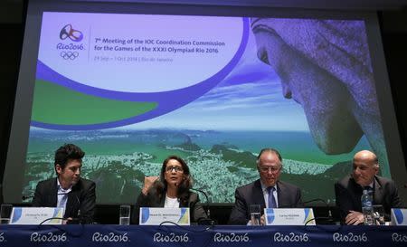 (L-R) International Olympic Committee (IOC) Sports Director Christophe Dubi, IOC Evaluation Commission head Nawal El Moutawakel, Rio 2016 Olympic Games Organising Committee President Carlos Arthur Nuzman and Chief Executive Officer of the Organising Committee for the Rio 2016 Olympic and Paralympic Games Sidney Levy attend a news conference in Rio de Janeiro October 1, 2014. REUTERS/Pilar Olivares