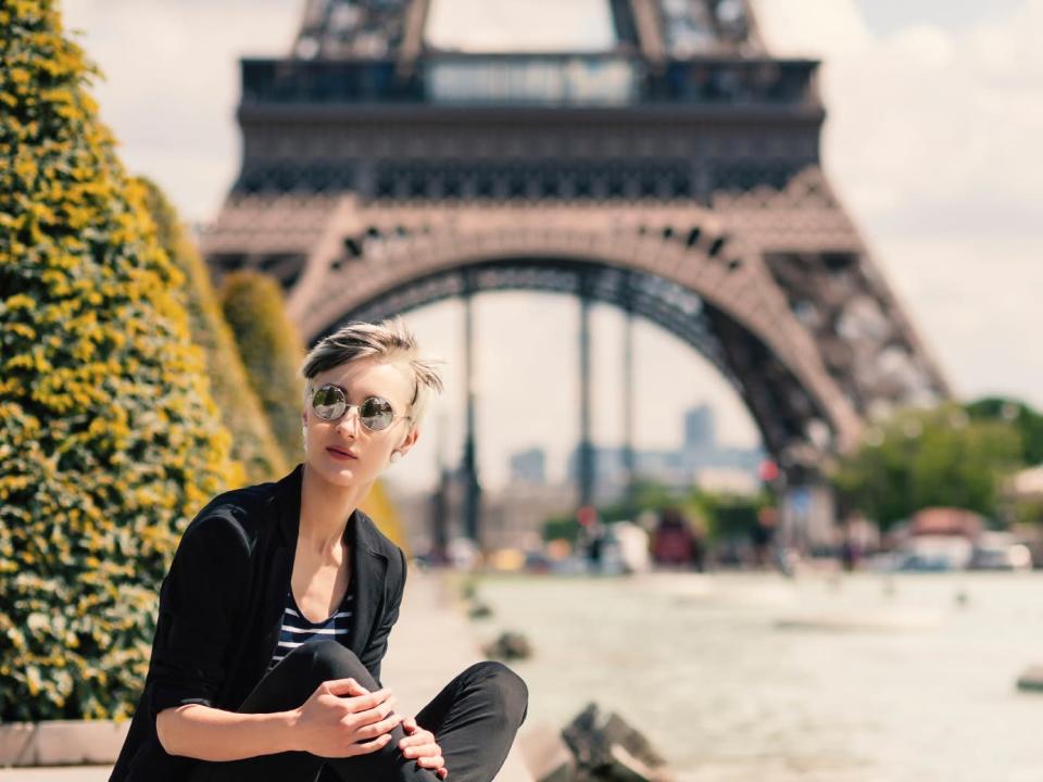 Woman in front of Eiffel Tower