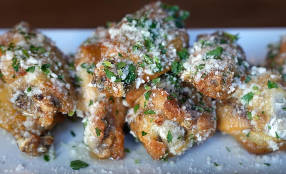 Garlic parmesan wings from Night Shift Kitchen and Tap inside Level99.