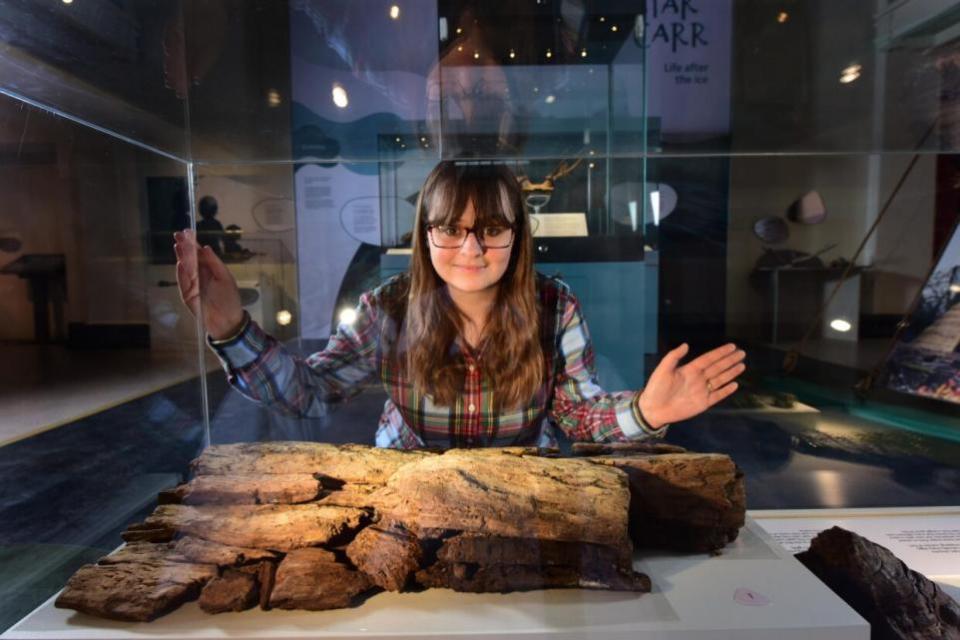 York Press: Curator Emily North with part of the 11,000-year-old Star Carr lakeside terrace at Yorkshire Museum